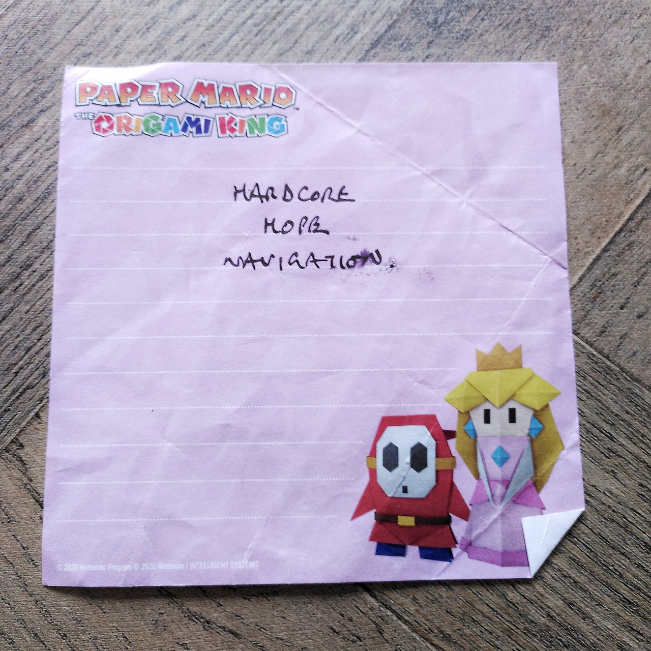 A piece of Paper Mario branded paper with the words 